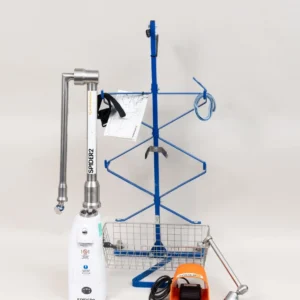 Smith & Nephew SPIDER2 powered surgical limb positioner system with mobile storage cart, electric foot pedal, positioning arm, table clamp, and accessories for orthopedic procedures.