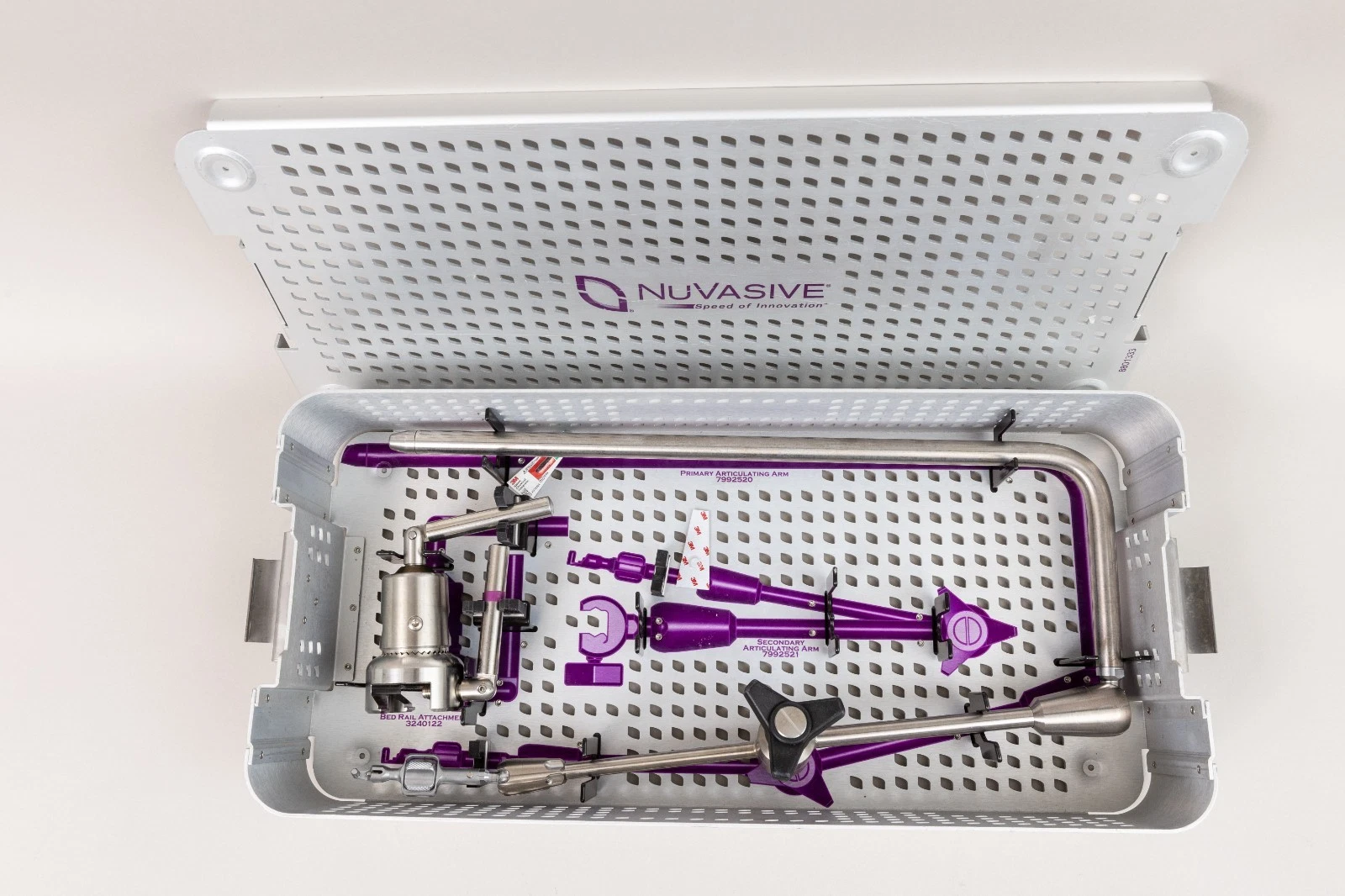 NuVasive MAXCESS-C articulating arm 7992520 with bed rail clamp 3240122 for secure mounting and positioning of compatible cervical retractor systems.