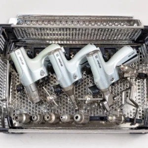 Stryker System 8 surgical power set with rotary handpiece, reciprocating saw, sagittal saw, drill attachments, collets, reamer attachment, and sterilization case.