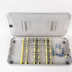 Aesculap Titanium McCulloch Lumbar Retractor System with hinged titanium frame, wide, narrow, hook, and toothed blades in sterilization container for posterior lumbar spine surgery.