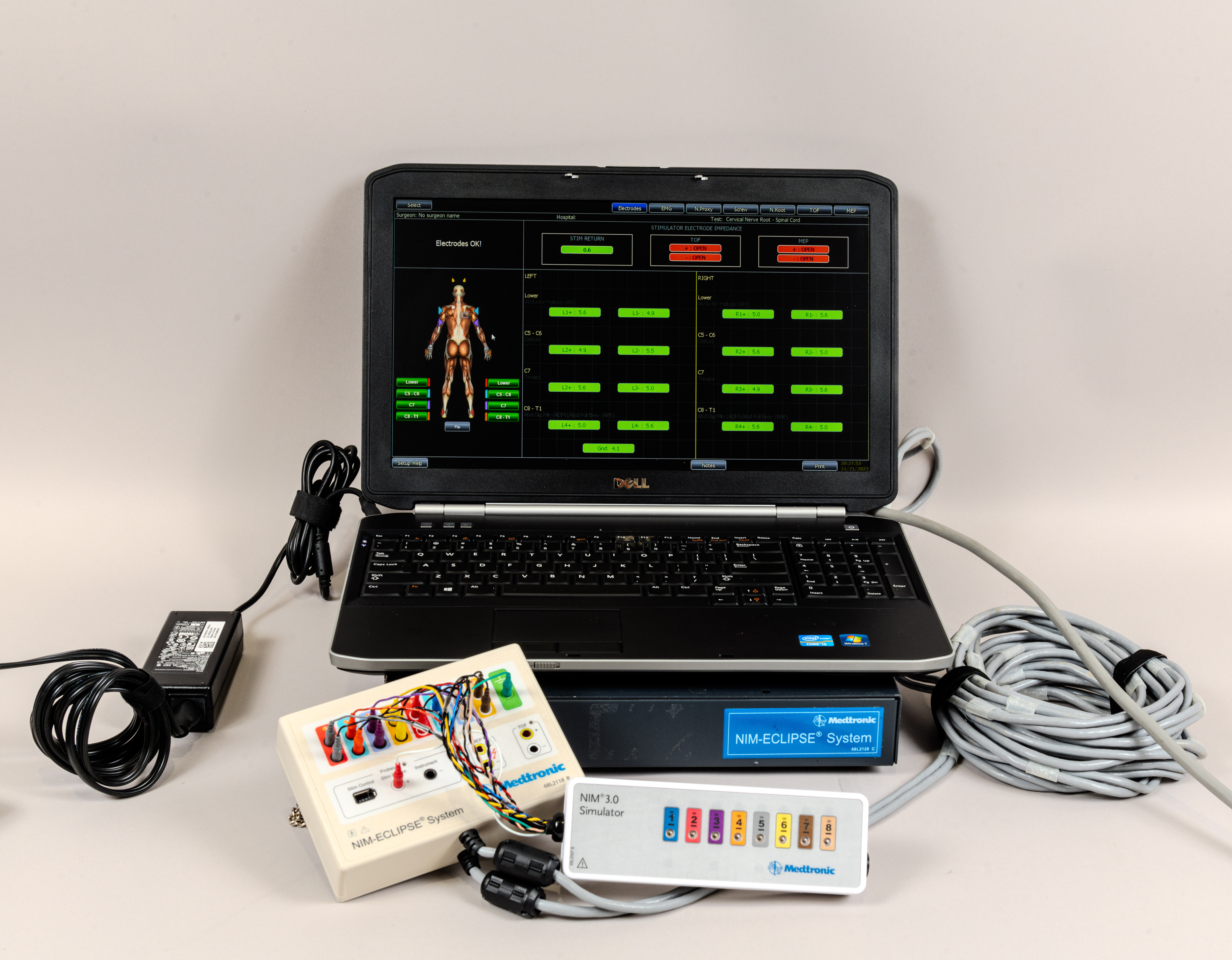 Medtronic NIM-ECLIPSE Surgeon Directed System with Dell laptop, NIM-ECLIPSE interface, NIM 3.0 Simulator, system module, cables, and power adapter.
